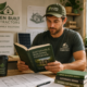 green contractor reading a book